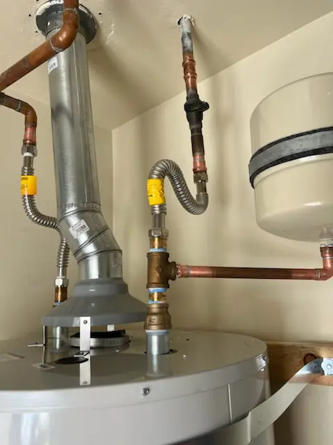Water heater installation and plumbing repair in Caruthers